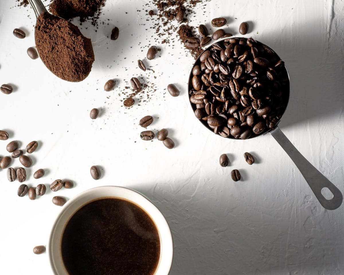Coffee cup with coffee beans