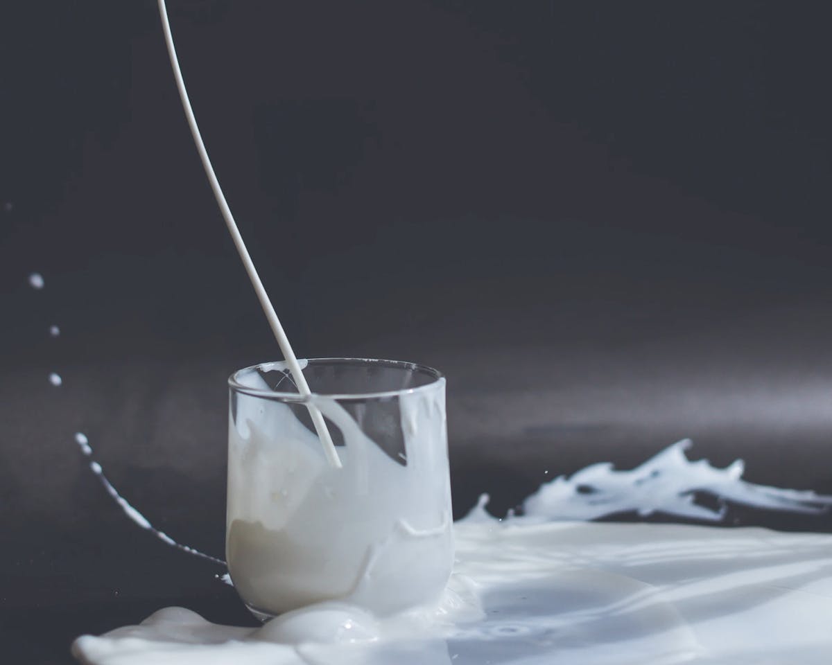 Pouring milk into a glass